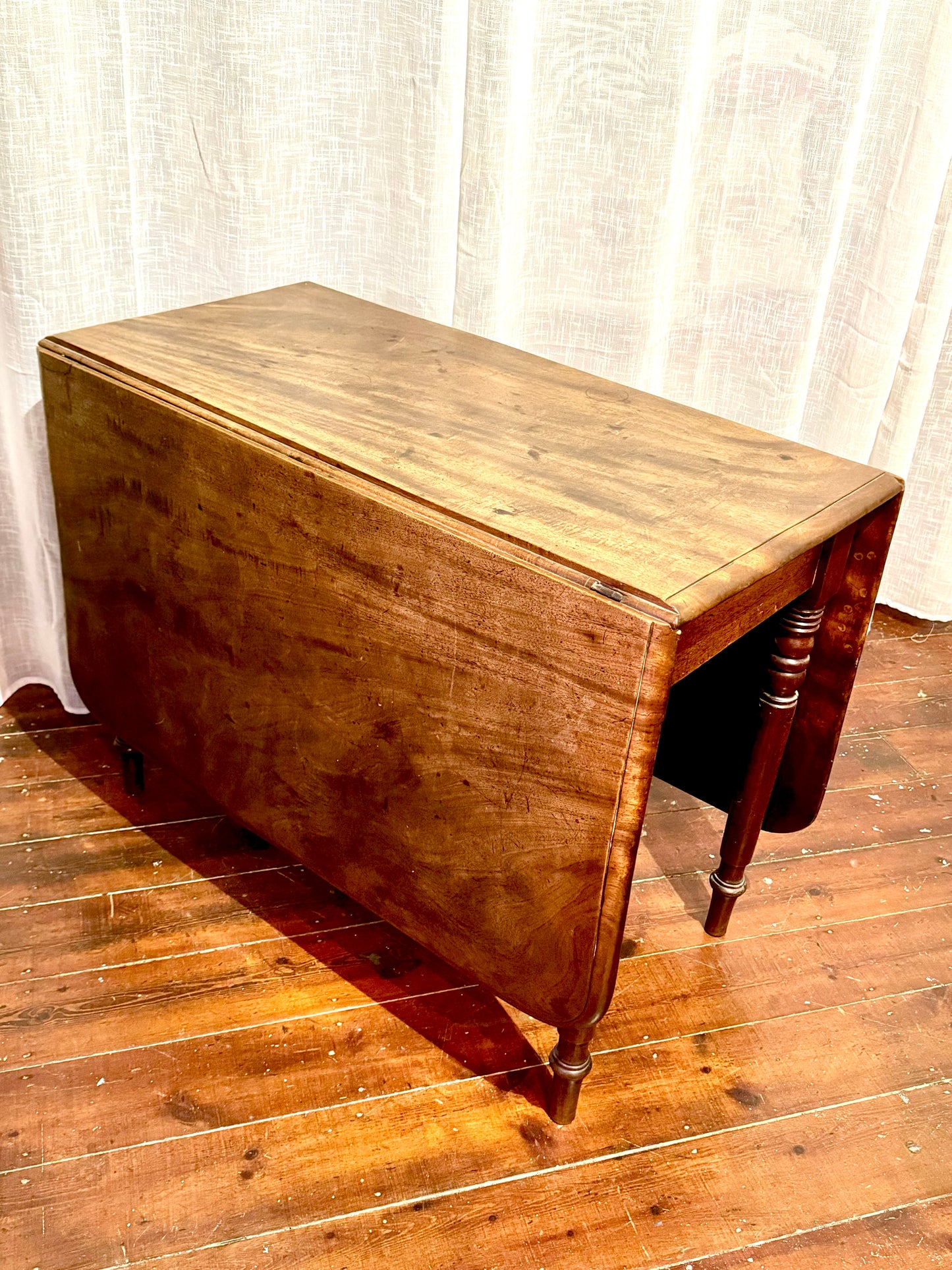 Large mahogany drop leaf folding dining table