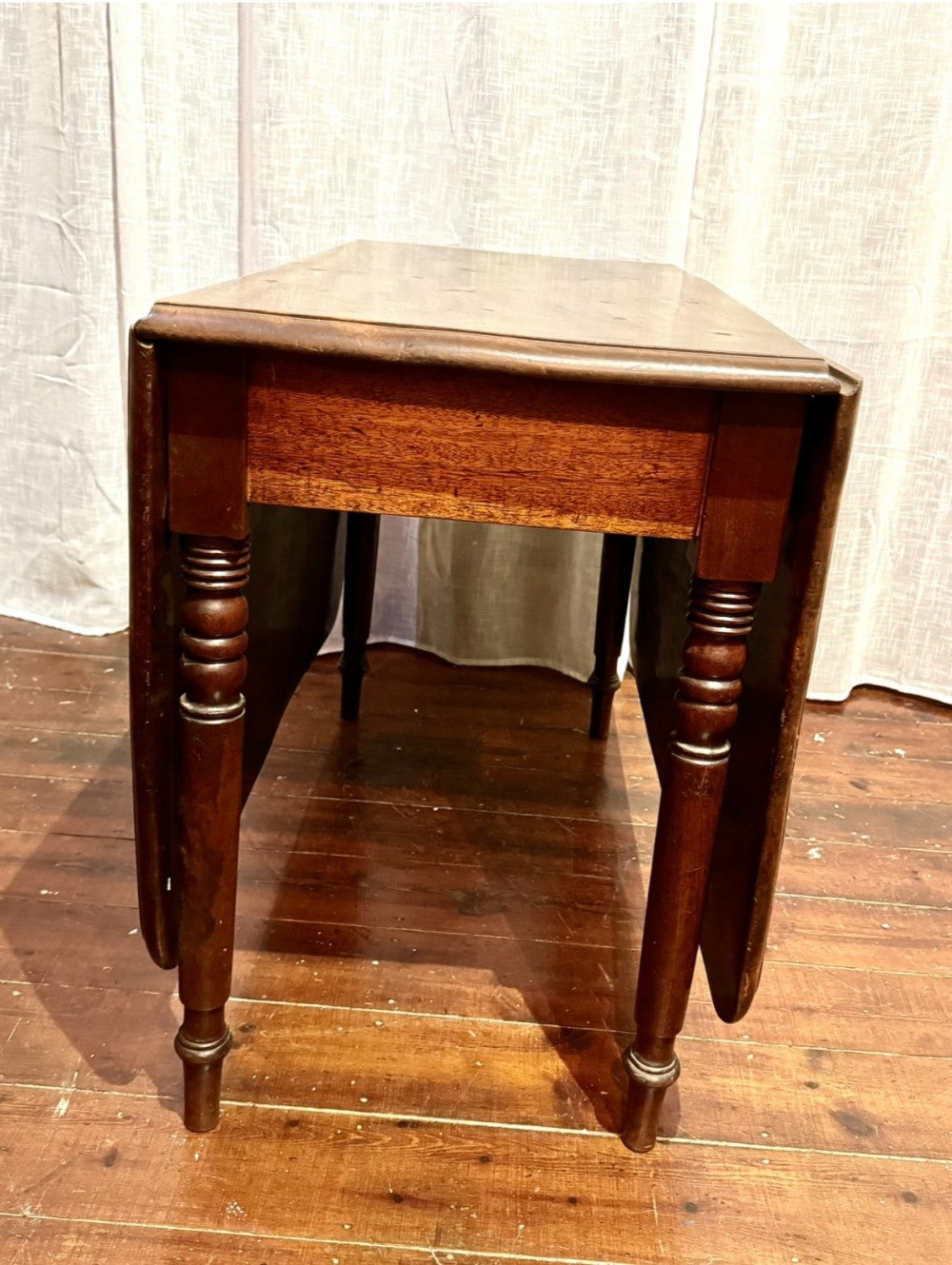 Large mahogany drop leaf folding dining table