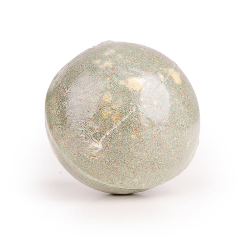 Close-up of round Peony scented bath bomb from the Hummingbird Collection. 