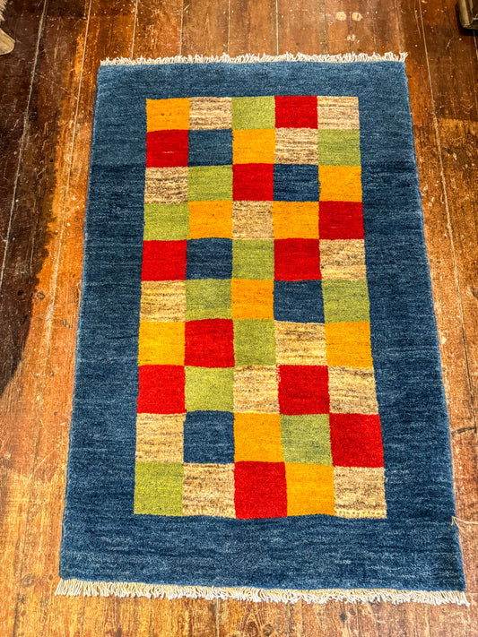 Handwoven Persian Gabbeh Wool Rug 130x85cm Check with Blue Border - Multicoloured Traditional Design